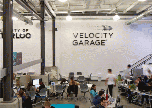 Startups working in the Velocity Garage in Downtown Kitchener. Velocity will become North America’s largest free business incubator thanks to a new partnership with Google and Communitech.